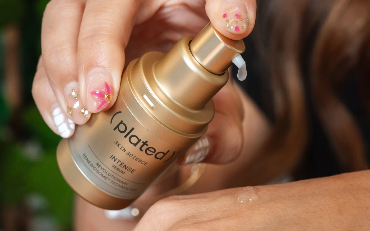 Plated Skin Science INTENSE Serum being applied at Nō Ka ʻOi Aesthetics